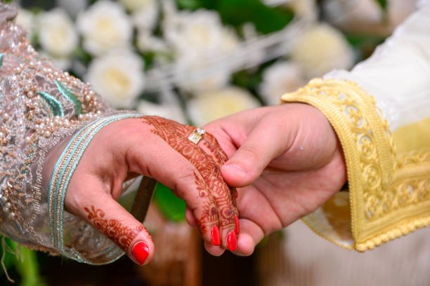 picture of man and woman with wedding ring.moroccan wedding.Wedding henna